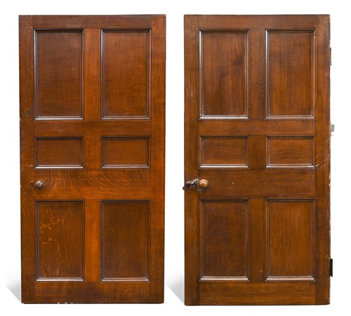 Lot 728 - A near pair of Georgian oak six panel doors