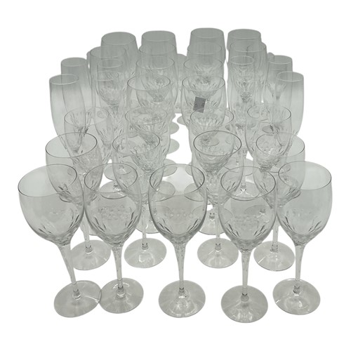 Lot 58 - Glassware, a long set of Orrefors stemware...