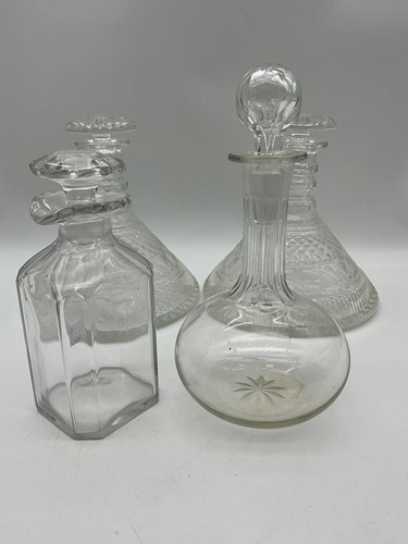 Lot 16 - A pair of ships decanters with hobnail and...