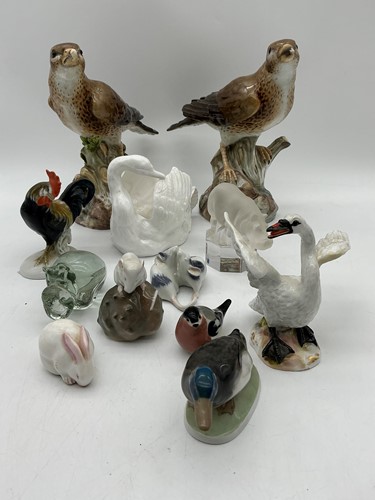 Lot 49 - A pair of Meissen fieldfares on branches with...