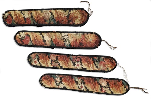Lot 345 - A set of four verdure tapestry curtain tie-backs