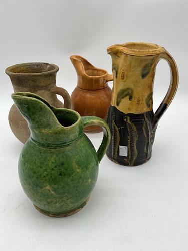 Lot 51 - A Medieval partially glazed earthenware jug,...