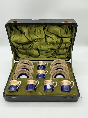 Lot 26 - A cased set of Royal Worcester coffee cups,...