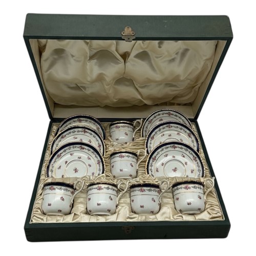 Lot 31 - A cased set of coffee cups and saucers,...