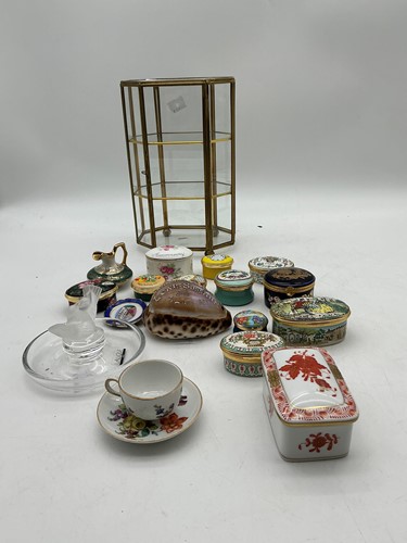 Lot 50 - A small octagonal brass and glass display...