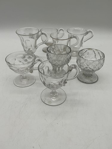 Lot 28 - A collection of six various custard cups,...